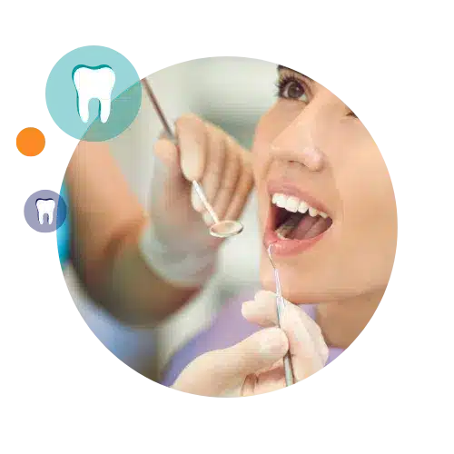 dentist looking at patient's teeth